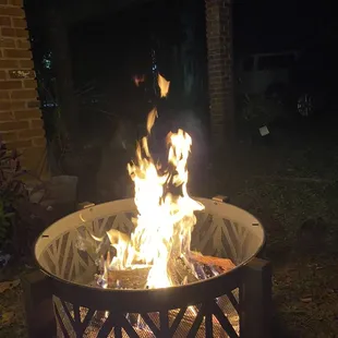 a fire pit in the backyard