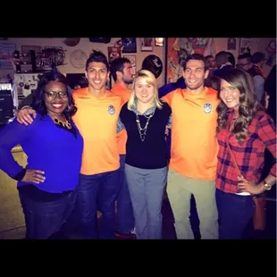a group of people posing for a picture