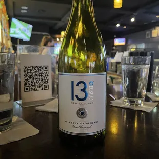 a bottle of wine on a table