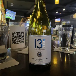 a bottle of wine on a table