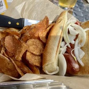 The Plain Janer with raw onions and a side of chips