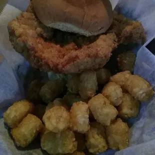 Thick, hand-breaded pork tenderloin and tater tots