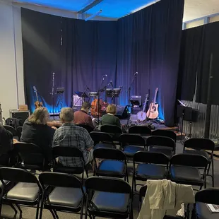 The side door, the stage before the band comes out