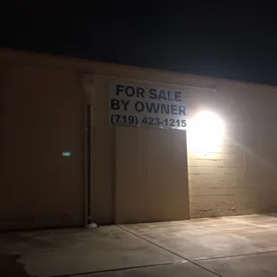 an empty parking lot at night