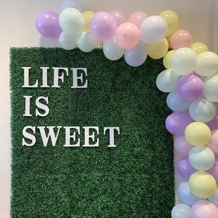 life is sweet sign and balloons