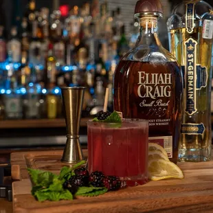 a bottle of rum and a cocktail