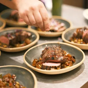 a plate of food being prepared