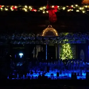 a bar with christmas lights