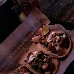 Bubba street tacos. Marinated carne asada with cilantro, onion and housemate creme fraiche and chipotle chimichurri sauce....mouth watering