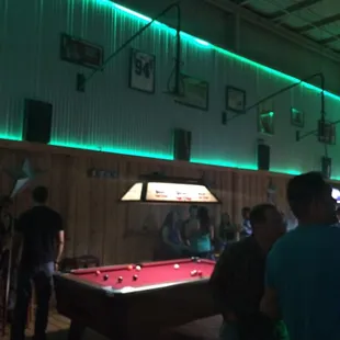 a pool table in a bar