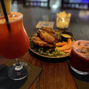 Honey curry wings, rum punch and sorrel with rum