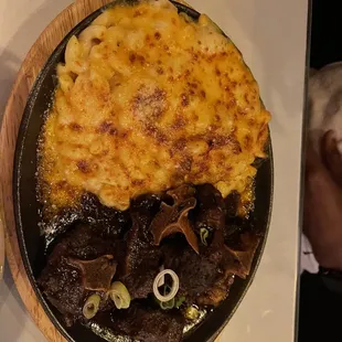 Jerk Oxtail Over Macaroni &amp; Cheese Pie