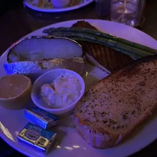Salmon dinner with an extra side of garlic bread