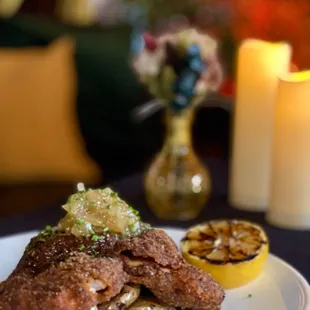 Pork Schnitzel, apple relish , mustard red wine sauce , Peruvian potato
