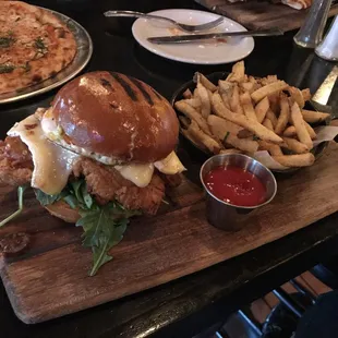 Today&apos;s Special: chicken burger with feta, egg, arugula and fries. The chicken was perfectly moist and crunchy!
