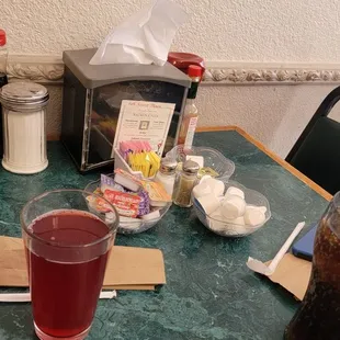 Messy table. The cranberry juice was extremely sour. But good, tho.