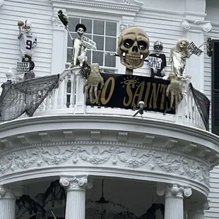 Up on the roof top, skeletons cheer for the Saints.