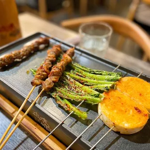 bbq beef, lamb, a choy, and steamed bun skewers (牛排, 羊肉, A菜, 馒头)
