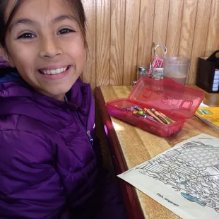 Picked out some color books to color with while waiting for our food!!