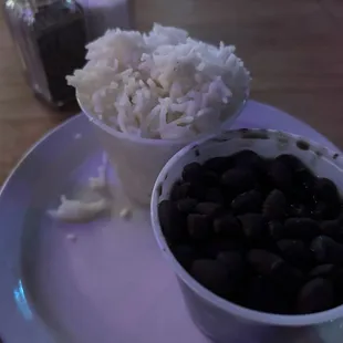 Store bought black beans in a Dixie cup with Trader Joe's quality rice. $4 --the only edible thing here tonight in my $17 investment here.
