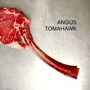 a piece of beef on a cutting board