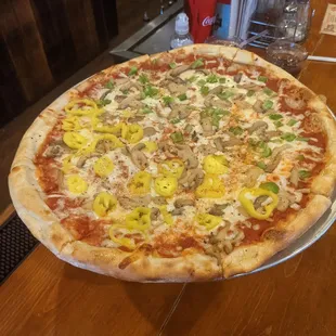 a pizza on a plate on a table