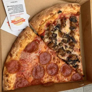 two slices of pepperoni and mushroom pizza