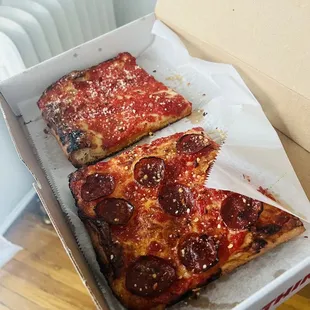 Vodka slice (far) pepperoni slice (close)