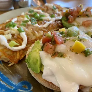 Eggs La Conner (poached eggs on English muffins with mango salsa and avocado) and loaded hash browns.