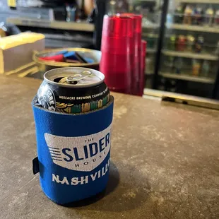 Canned beer comes with coozy