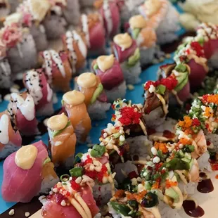 a variety of sushi rolls