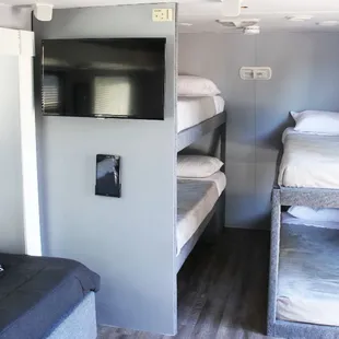 Flat screen TV and wall mounted tablet filled with fun apps.