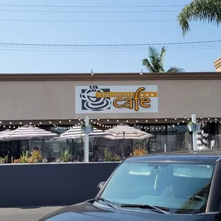 cars parked in front of it