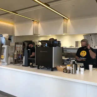 a man standing at the counter