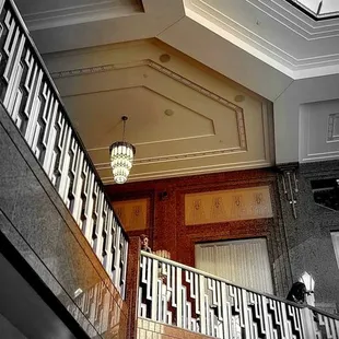 a black and white photo of a staircase