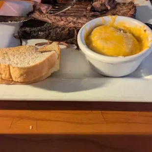 Brisket Plate with Cheesy Smashed Potatoes