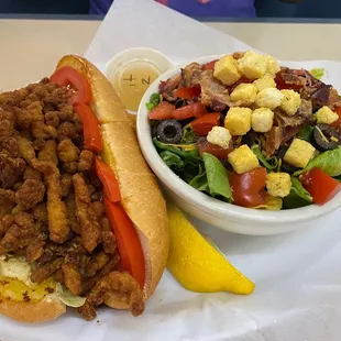 Po boy $15.99 with sub green salad for $3.50