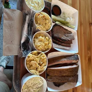 Brisket, ribs, mac &amp; cheese, potato salad, coleslaw, with pickles, and onions. 66 before tip.