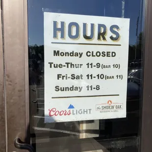 Hours of operation, front entry door.