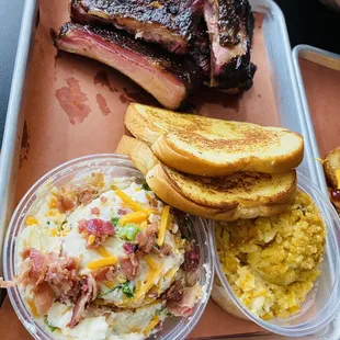 Half a slab of ribs, loaded potato salad, corn casserole! All of the items were so delicious!!