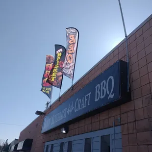 an american flag flying over the bbq