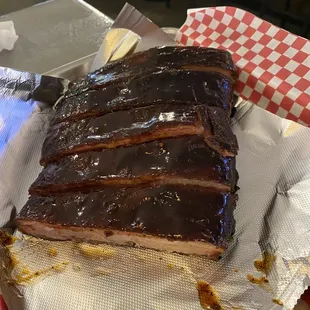 Half rack of ribs with sweet sticky sauce.