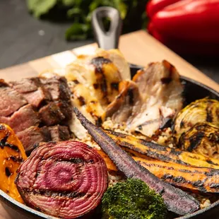 a plate of meat and vegetables