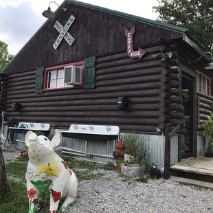 the front of a log cabin