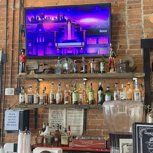 a bar with various liquors