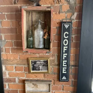 a brick wall with a picture of a man