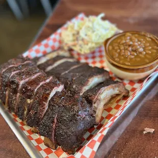 Baby back ribs, baked beans and coleslaw.