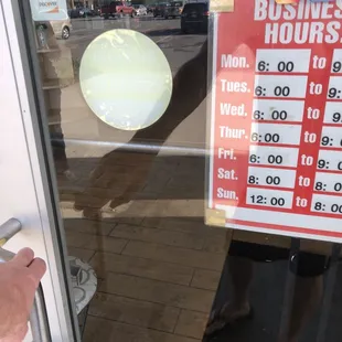 a business hours sign