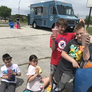 Happy kids with full bellies of healthy smoothies