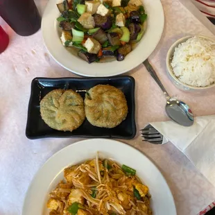 Pad thai, chive dumplings, basil eggplant, and rice